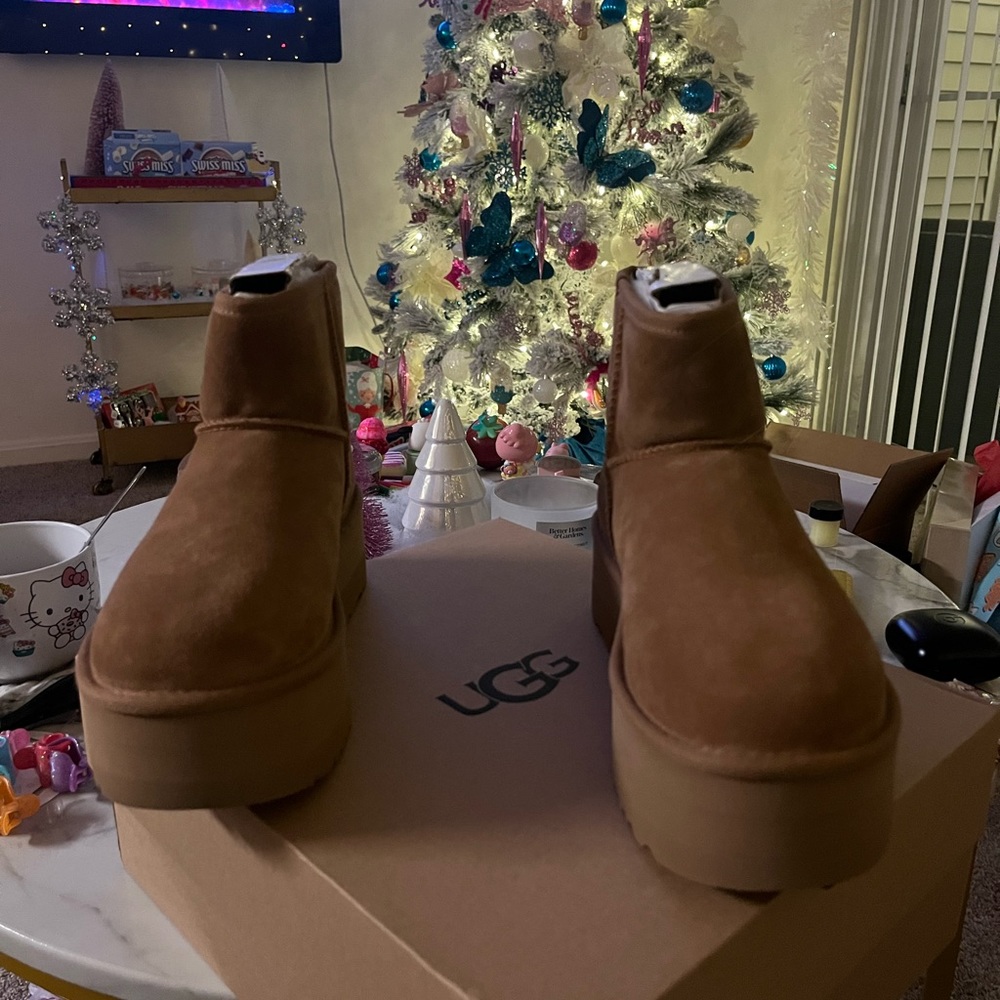 Brand New Women UGG Boots Mini Classic Platforms….Size 8 for Women….$200…..